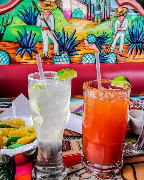 Two cocktails on the bar